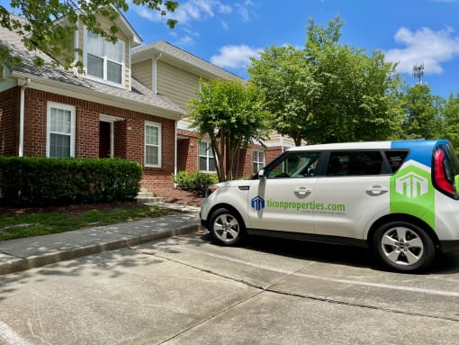 A Ticon Car parked outside of Highgate Townhomes.