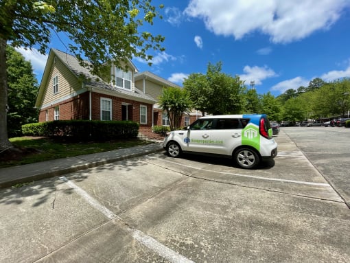 A Ticon Car parked outside of Highgate Townhomes.