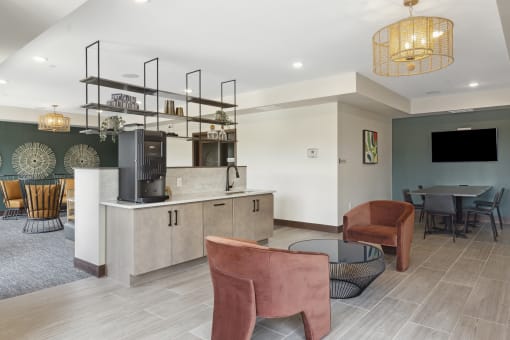 a resident clubhouse with a kitchen and dining area