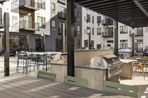 outdoor patio with grills at apartments in west saint paul MN