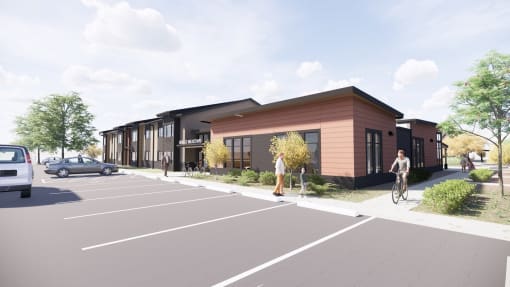 a rendering of a building with a street in front of it