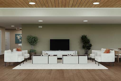A living room with a white sofa set and a black television.