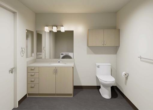 A white toilet sits in a bathroom with a sink and mirror.
