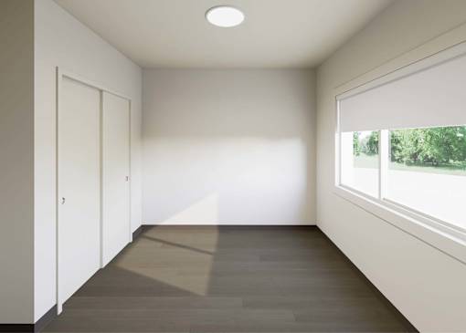 A room with a window and a door.