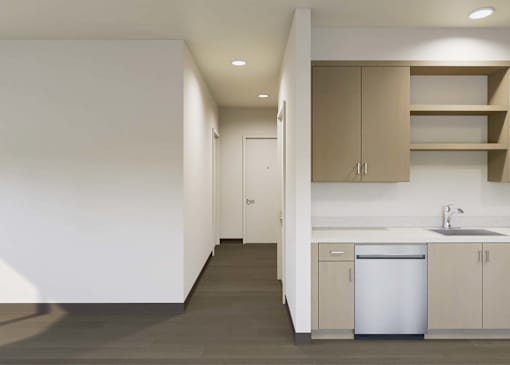 A kitchen with a white dishwasher and brown cabinets.