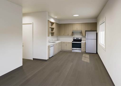 A kitchen with a white fridge, stove, and cabinets.