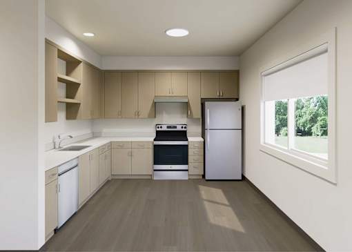 A modern kitchen with wooden floors and white appliances.