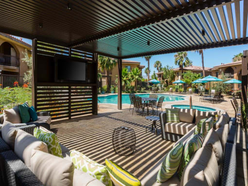 Shaded Lounge Area By Pool at Medici Apartment Homes, Bermuda Dunes, CA