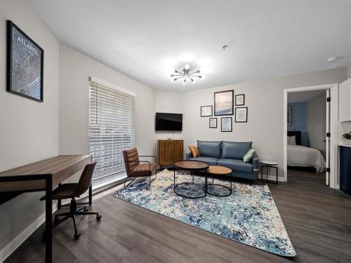 Furnished Living Room with couch at the 505 Collection in Atlanta, Georgia.