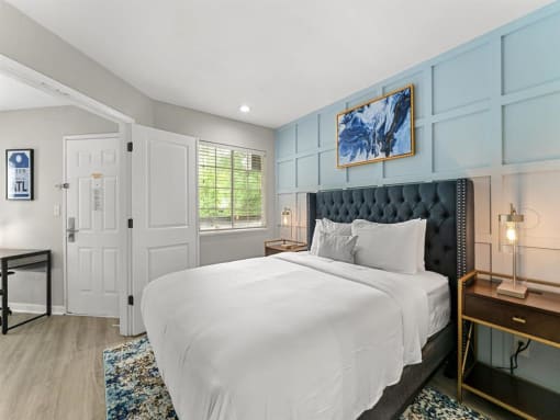 Furnished Bedroom with window at the 505 Collection in Atlanta, Georgia.