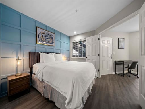 Furnished Bedroom with lamp at the 505 Collection in Atlanta, Georgia.