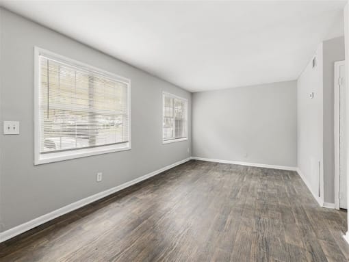 Spacious Living Room New Flooring Throughout  at Pinewood Townhomes, Tucker, GA
