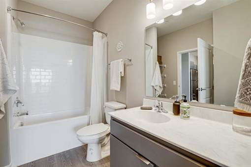 Bathroom With Bathtub at Maven Apartments, Burnsville, MN