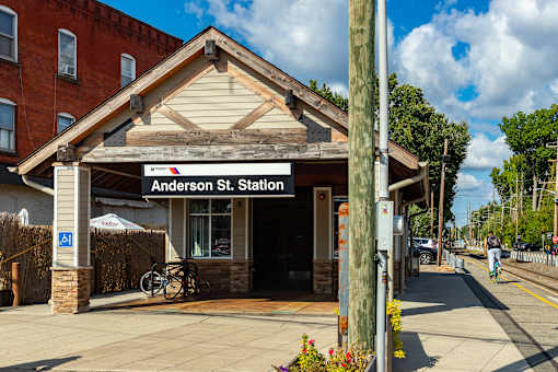 A small building with a sign that says Anderson St. Station.