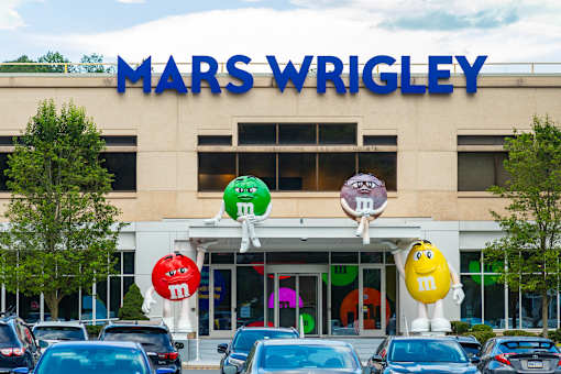 Mars Wrigley store with colorful M&M's balloons in front.