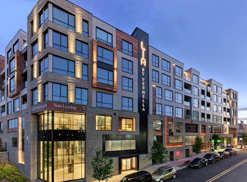 Luxury apartment rental community with expansive amenity package and resort-style pool