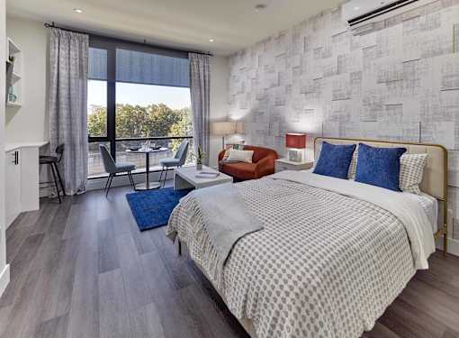 spacious studio home, oversized windows, custom closets, full size appliances