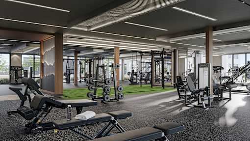 Fitness center with cardio machines, free weights, turf area, personal training
