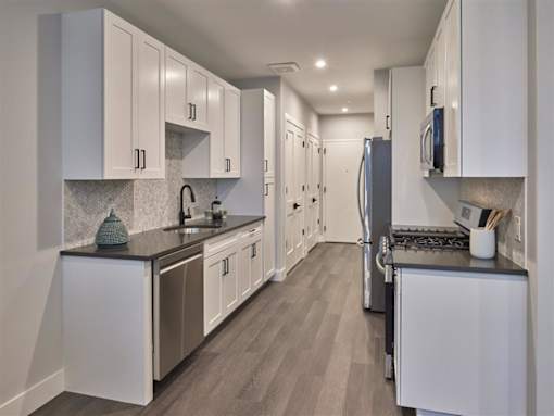 ample cabinet space and stainless steel appliances in spacious kitchen in 1 bedroom apartment, Hackensack NJ