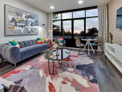 Apartment home with large windows and vibrant furnishings at Vermella Union, Union NJ
