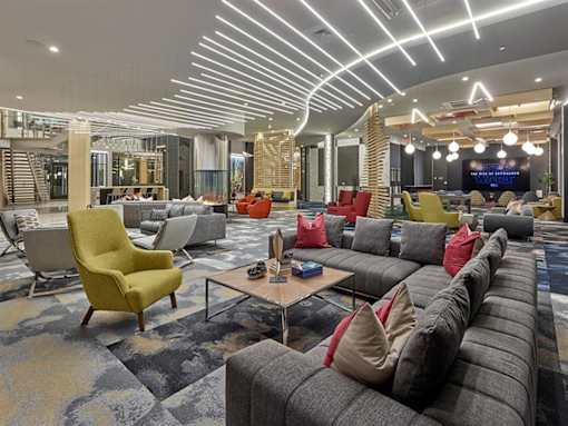 Union Club lounge with comfortable seating at Vermella Union, Union NJ