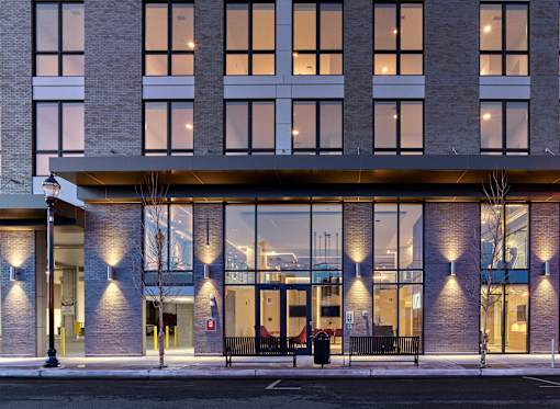 Exterior night view of Ora luxury apartments with contemporary architecture in Hackensack, NJ