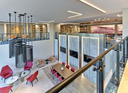 Spacious indoor lobby with large windows and stylish seating at Ora in Hackensack, NJ