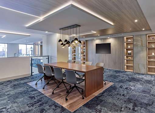 Upscale resident common area with bar seating and open layout at Ora luxury apartments in Hackensack, NJ