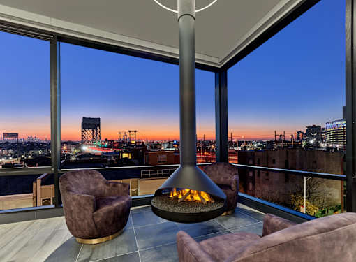 Sky lounge with fireplace seating, Vermella Broad Street Newark NJ upscale resident amenity space