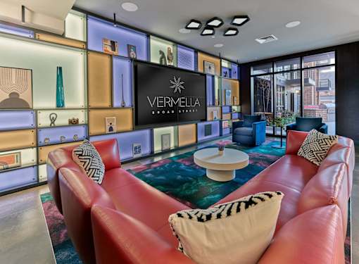 clubroom, resident amenity space, bar area, lounge seating, billiards, shuffleboard, fireplace,