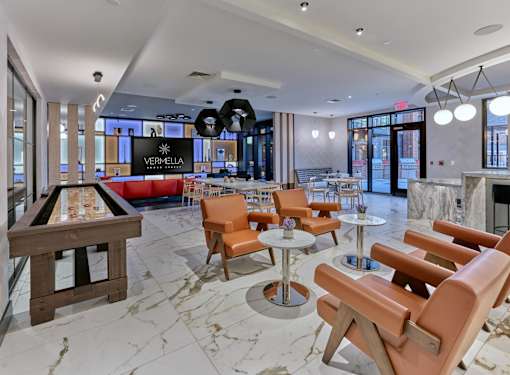 clubroom, game tables, fireplace, bar area, lounge seating, table seating, private conference room