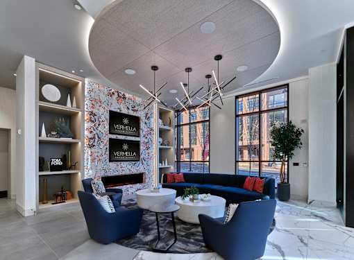Clubroom with coworking lounge seating, private conference rooms, Vermella Broad Street Newark NJ