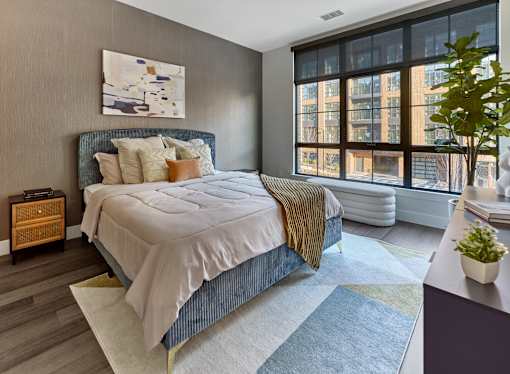 Apartment with oversized windows, hardwood flooring, large bedrooms, and built-in closets at Vermella Broad Street, Newark NJ