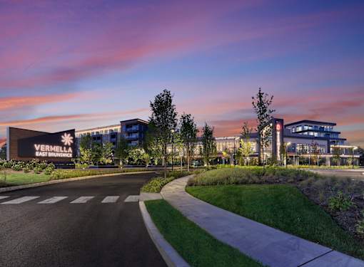 A modern building with a large sign that reads