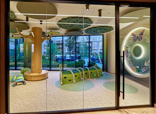 A glass door with a butterfly design on the right side.