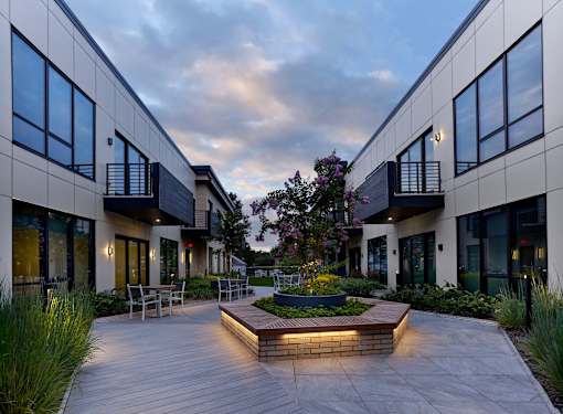 outdoor lounge, patio, clubroom, tv, fireplace