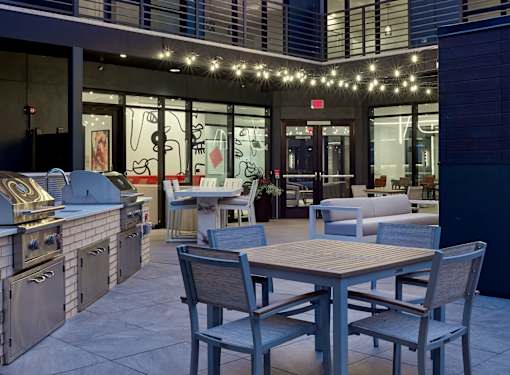 outdoor lounge, clubroom, fire place, grills