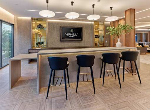 Resident clubroom with bar area and private dining