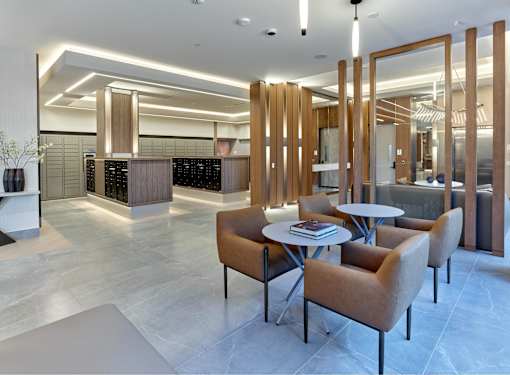 A modern lobby with concierge in a luxury apartment community