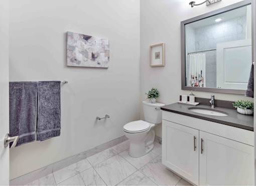 stone countertops, tile bathroom, large bathroom