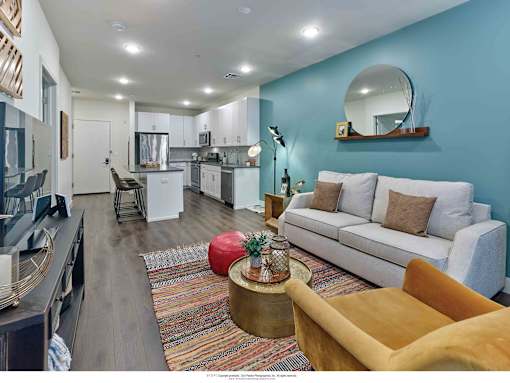 one bedroom, open layout, open floorplan, island, stone countertop, hardwood floors, stainless steel appliances