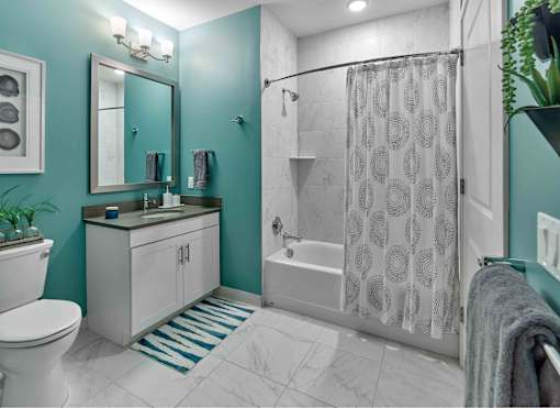 large bathroom, stone countertops, tile bathroom,