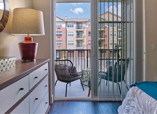 private balcony, bedroom, one bedroom, hardwood floors, oversize windows