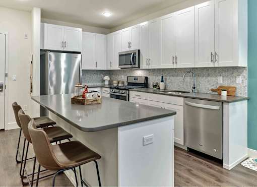 chef kitchens, stainless steel appliances, quartz countertops, stone countertops