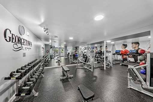 Georgetown of St. Louis Apartments fitness center equipped with Precore and Peloton equipment