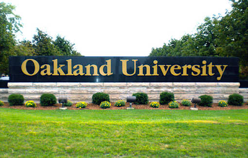 Oakland University entrance sign near River Oaks at Rochester Hills Apartments & Townhomes in Rochester Hills MI.