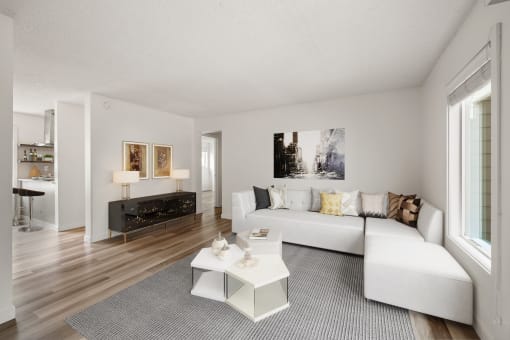 Living room with a white couch and a coffee table at Larkspur West Linn, West Linn, OR