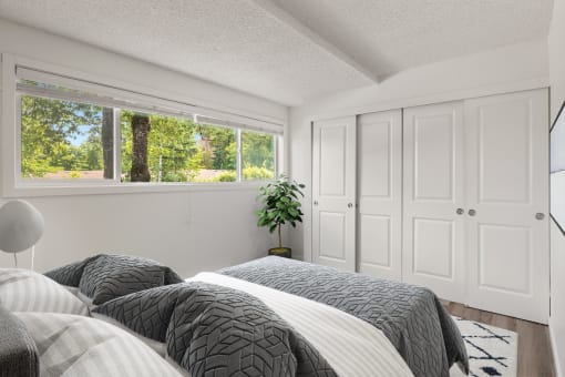 Bedroom with two beds and a window at Larkspur West Linn, West Linn, OR, 97068