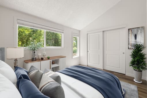 Bedroom with a large bed and a window at Larkspur West Linn, West Linn