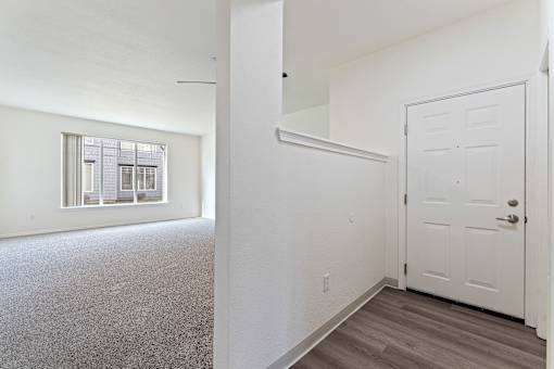 A white door is on the right side of the image.
